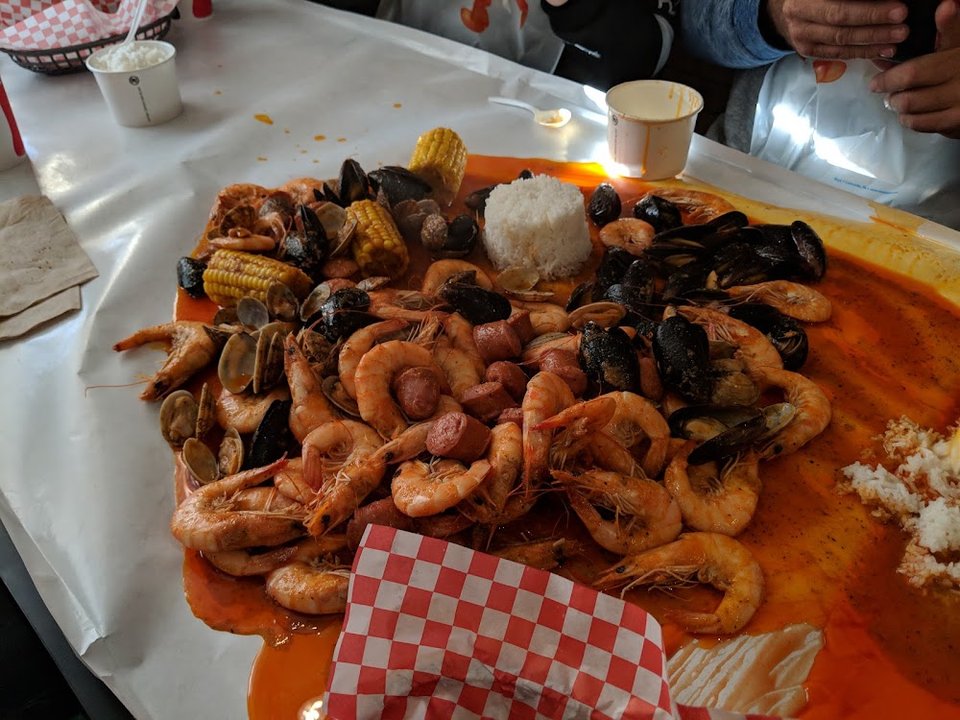 Menu page listing Cajun seafood sides